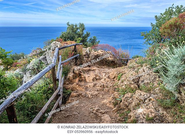 Path over Gulf of Castellammare faces the Tyrrhenian Sea in Riserva Naturale Orientata dello Zingaro natural park, the first reserve in Sicily, Italy