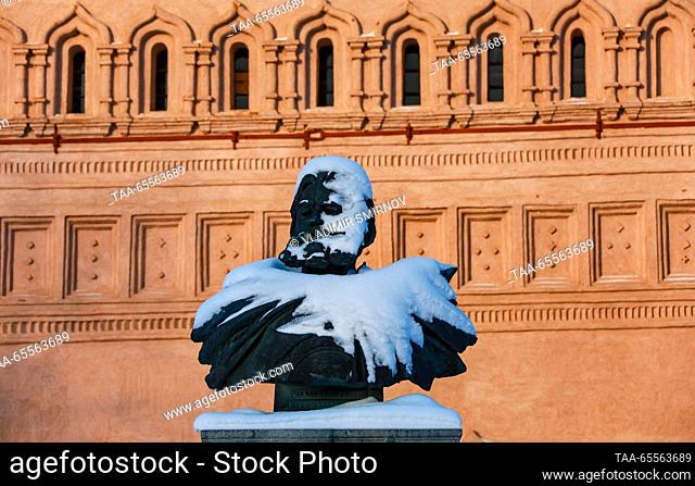 RUSSIA, VLADIMIR REGION - DECEMBER 8, 2023: A snow-covered bust of Prince Dmitry Pozharsky is seen by the Saviour Monastery of St