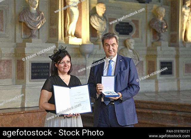 Yasemin GUENAY receives the Bavarian Order of Merit from Markus SOEDER (Prime Minister of Bavaria and CSU Chairman). Awarding of the Bavarian Order of Merit in...