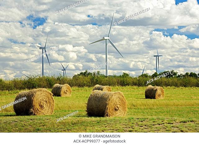 Wind turbines and bales Rosenhof Saskatchewan Canada