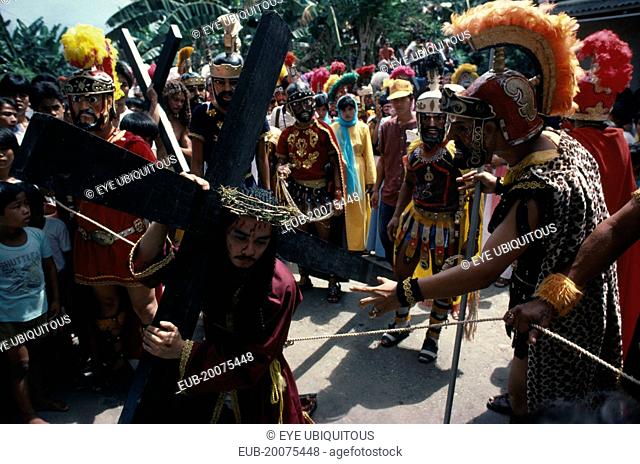 Moriones Festival passion play re-enactment of the story of the Roman soldier Longinus and the crucifixtion of Jesus on Good Friday