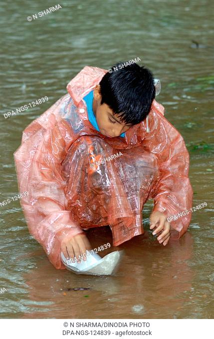 Child in Rain Water , India MR