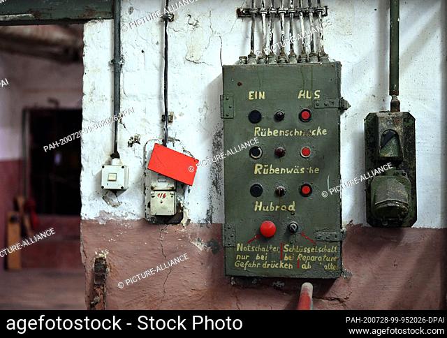 23 July 2020, Thuringia, Oldisleben: ""Beet snail"" and ""Beet washing"" is written on a switchboard in the Oldisleben sugar factory