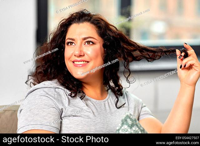 portrait of happy young woman at home