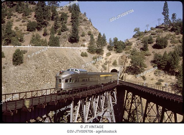 California Zephyr Train Exiting Tunnel on Elevated Track, California, USA, 1964