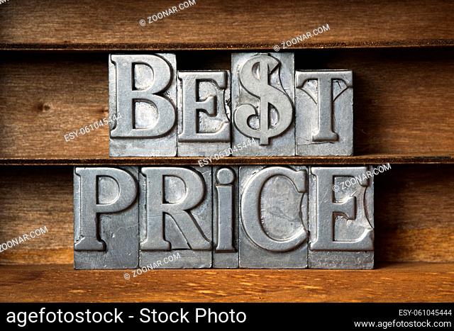 best price phrase with dollar sign made from metallic letterpress type on wooden tray