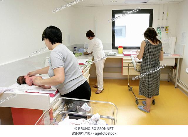 Photo essay at the hospital of Meaux 77, France. Department of maternity. Central nursery. Mothers are caring of their newborn babies with the advices of a...