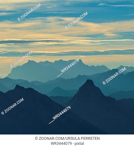 Morning scene in Switzerland. Silhouettes of Mount Grosser Mythen and other mountains of the Swiss Alps