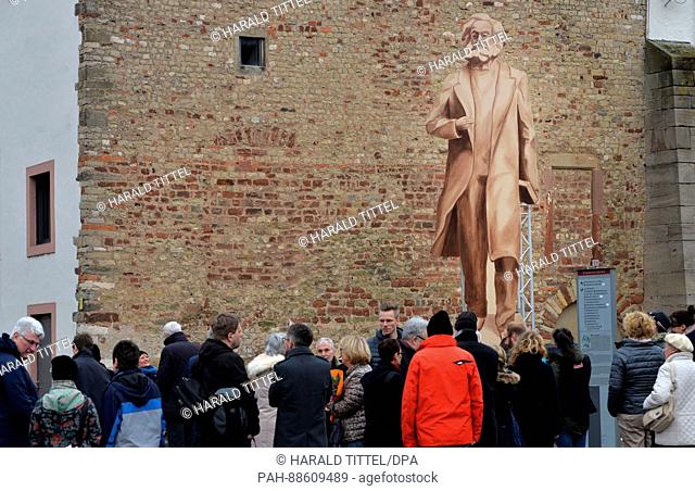 A wooden cut out of the planned Karl Marx statue, which is to be 6.30 meters high, can be seen in Trier, Germany, 01 March 2017