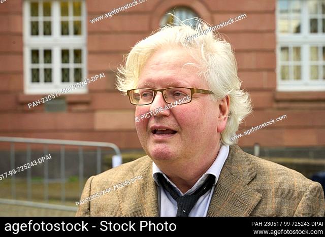 17 May 2023, Rhineland-Palatinate, Koblenz: Attorney Michael Baitinger gives interviews at the end of the first day of the trial against members of the ""United...