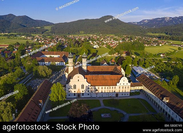 Benediktbeuern monastery, with inner courtyard, Benediktbeuern and Benediktenwand at the back, Tölzer Land, drone shot, Alpine foothills, Upper Bavaria, Bavaria