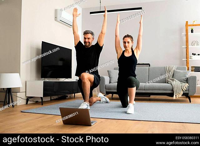 Online Home Fitness Workout And Exercise In Living Room