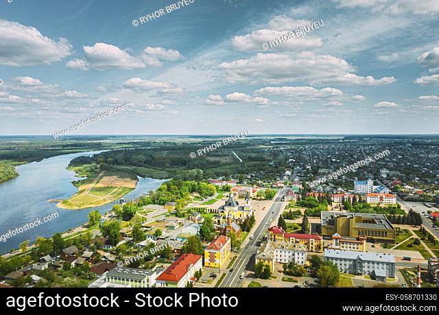 Rechytsa, Belarus. Aerial View Of Residential Houses And Famous Landmarks Of Town - Holy Assumption Cathedral And Holy Trinity Church In Sunny Summer Day