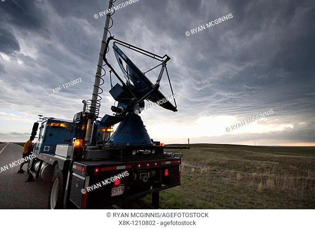 A Doppler on Wheels truck scans a supercellular thunderstorm in rural Wyoming, May 21, 2010  The DOW truck is participating in Project Vortex 2