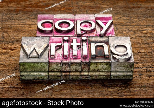 copywriting - text in vintage letterpress metal type blocks on a grunge, weathered wood, business, marketing and public relations concept