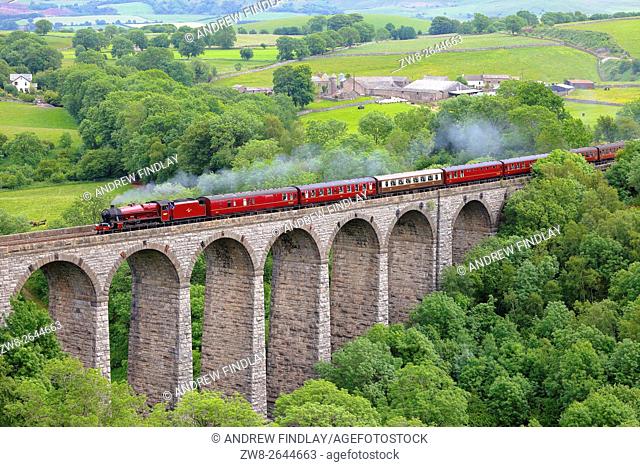 Steam train crossing Smardale Viaduct. Settle to Carlisle Railway Line, Eden Valley, Cumbria, England, UK