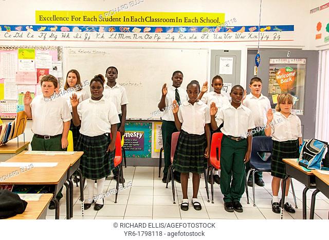 Bahamian school children practice the graduation oath in New Plymouth on Green Turtle Cay, Bahamas