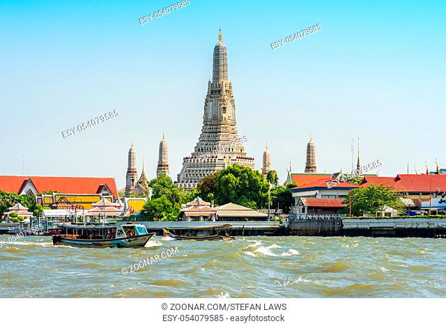 The buddhist temple Wat Arun in Bangkok. The exterior is by seashell and porcelain. Wat Arun is among the best known of Thailands landmarks