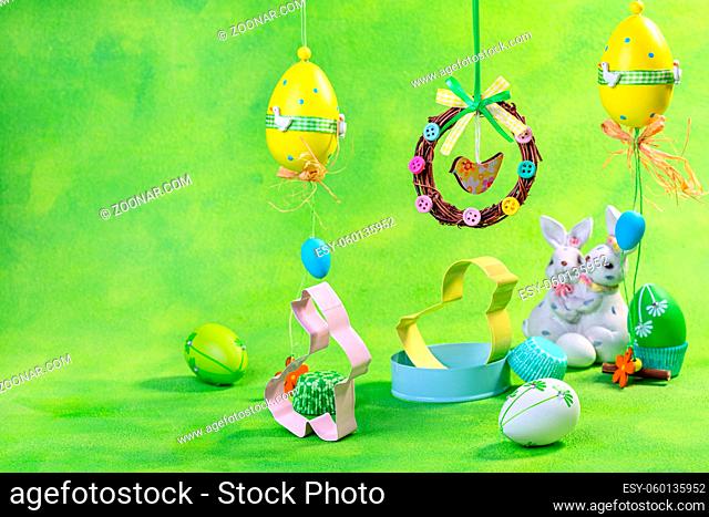 Easter eggs, cookie cutters and funny bunnies. Easter concepts with copy space