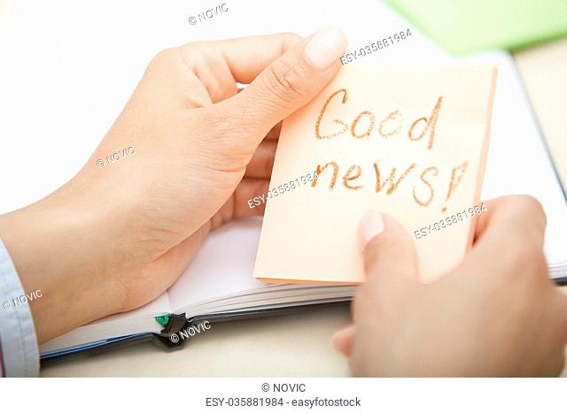 Good news text on adhesive note