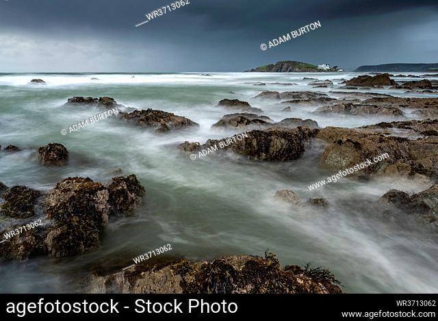 Stormy conditions on the rocky Bantham coast in autumn, looking across to Burgh Island, Devon, England, United Kingdom, Europe