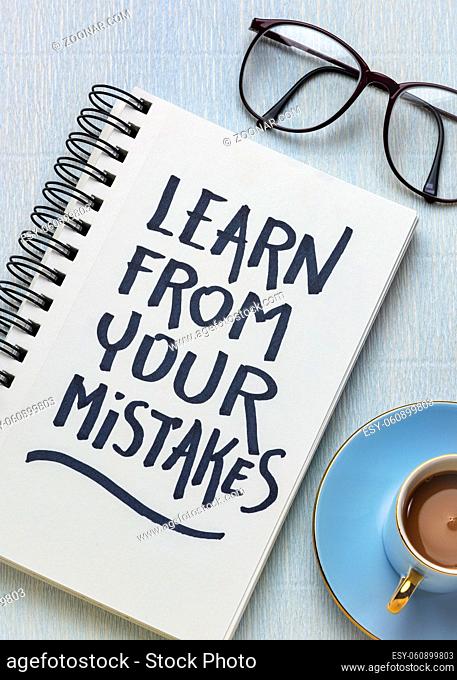 Learn from your mistakes reminder - handwriting in a sketchbook with a cup of coffee, learning, determination and perseverance concept