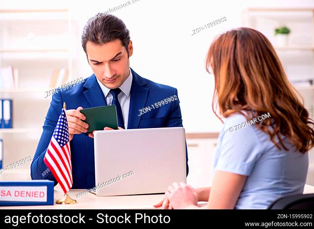 Young woman visiting american embassy for the visa