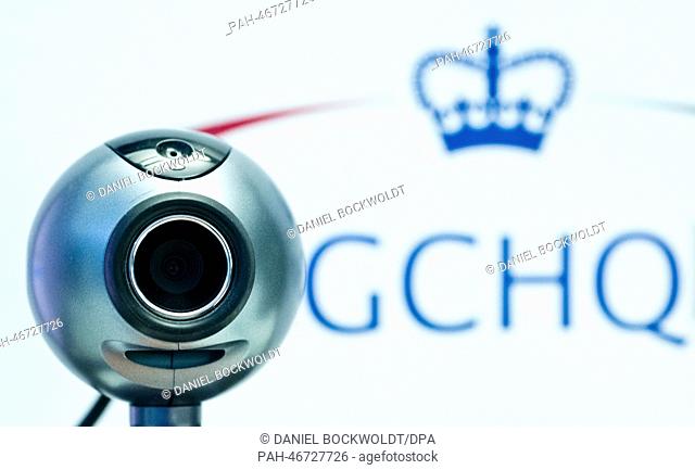 ILLUSTRATION - An illustration shows a webcam in front of the logo of the British intelligence agency Government Communications Headquarters (GCHQ) in Berlin