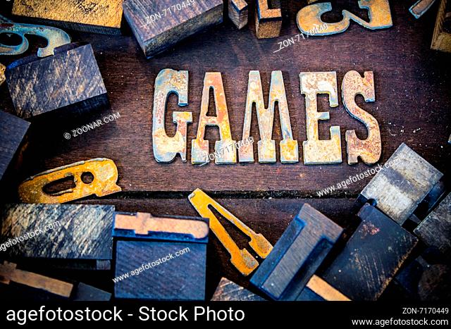 The word GAMES written in rusted metal letters surrounded by vintage wooden and metal letterpress type