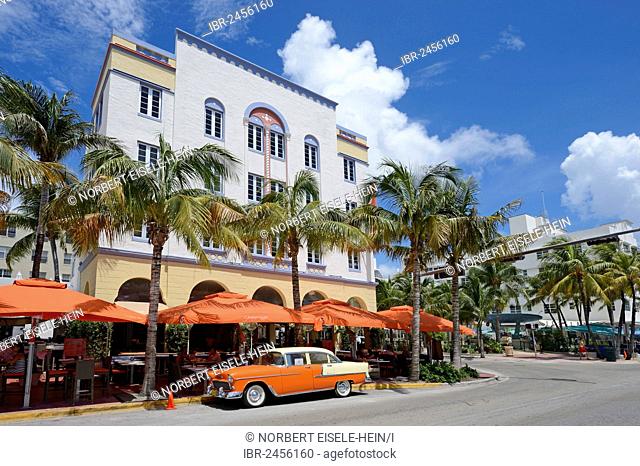 A classic car parked on Ocean Drive, South Beach, Miami, Florida, USA