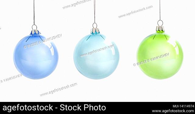 beautiful glass christmas balls against a white background