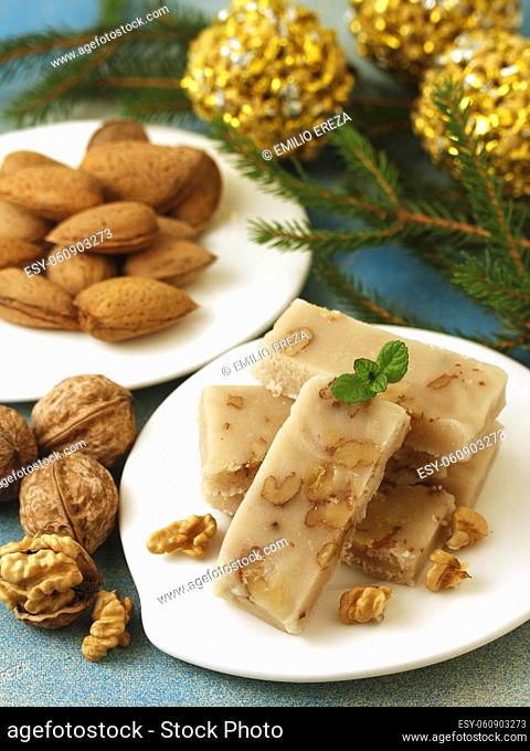 Turrón de mazapán y nueces. Marzipan nougat with walnuts. Typical dessert from Spain for Christmas