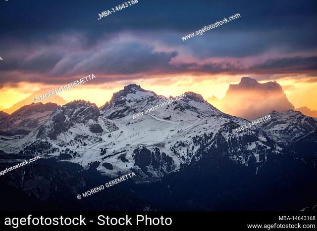 Italy, South Tyrol, province of Bolzano, fiery dawn near Alpe di Tires hut / Schutzhaus Tierser Alpl towards the Pordoi pass