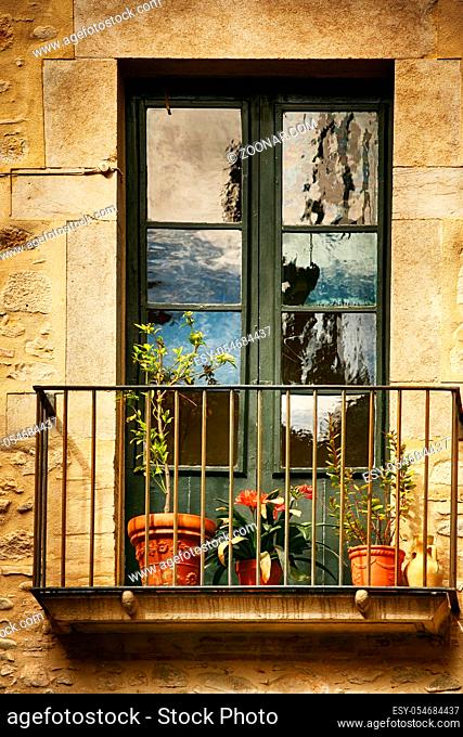 Spanish Windows with Balcony, Decorated With Fresh Flowers, Vintage Style