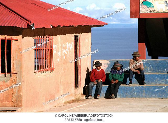 Men on Isla Amantani, Lake Titicaca, Peru