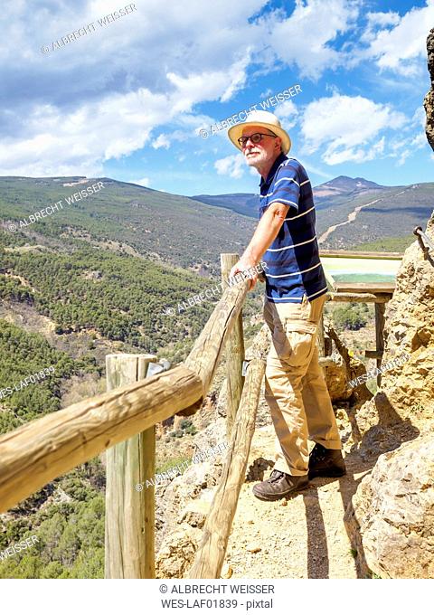 Spain, Sierra Nevada, Laujar de Andarax, senior man enjoying view