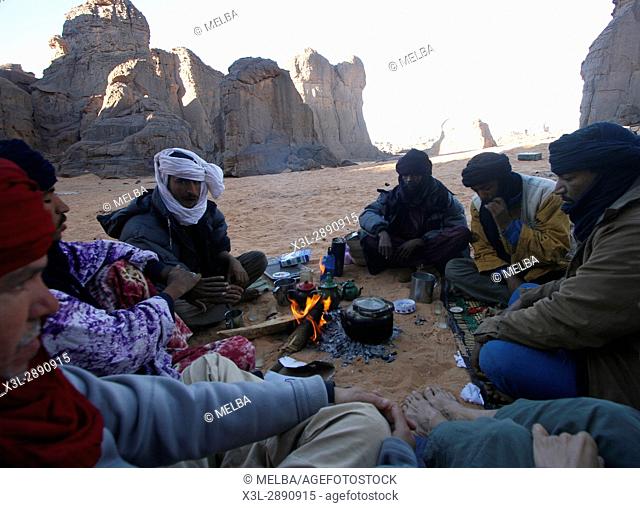 Tuaregs in campfire. El Ghessour. Tassili Ahaggar. Sahara desert. Algeria