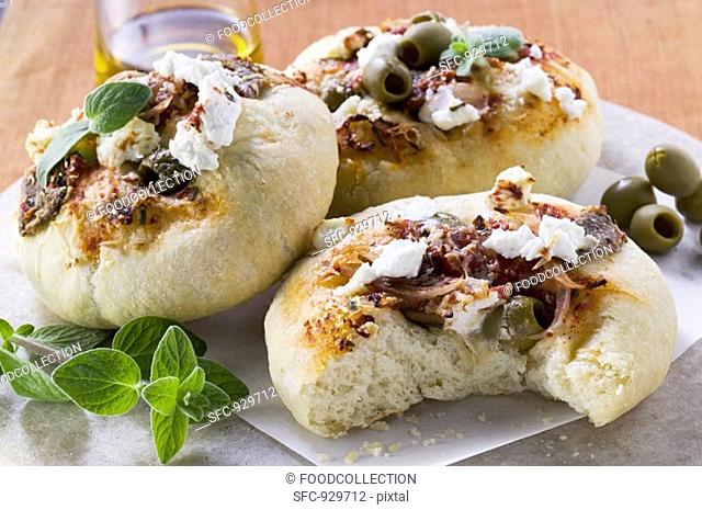 Mini-pizzas with olives and cheese Sicily