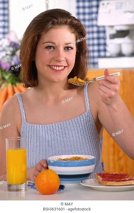 WOMAN EATING BREAKFAST<BR>Model