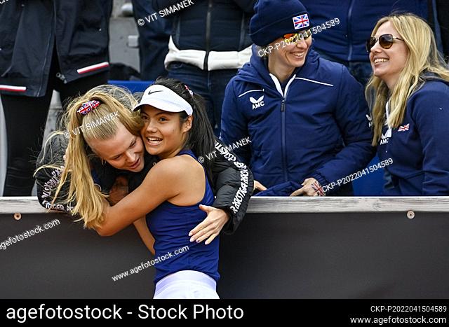 Emma Raducanu of Britain, second from left, celebrates with her teammates Harriet Dart after winning the match against Tereza Martincova of Czech Republic...
