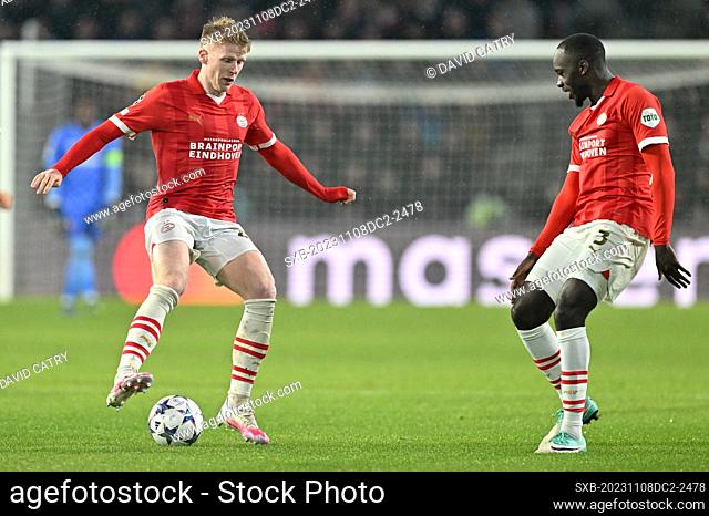 Jerdy Schouten (22) of Eindhoven and Jordan Teze (3) of Eindhoven pictured during the Uefa Champions League matchday 4 game in group B in the 2023-2024 season...