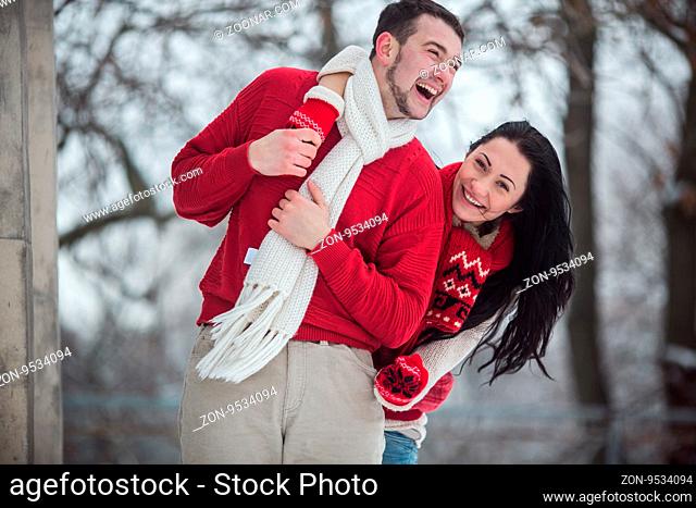 Stylish young couple is spending time together outdoors. - a Royalty Free  Stock Photo from Photocase