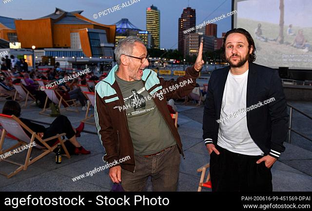 16 June 2020, Berlin: Director Dani Levy (l) and leading actor Dimitrij Schaad come to the Arte Sommerkino Kulturforum for the open-air premiere of ""The...
