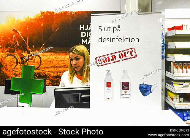 Stockholm, Sweden A sign in Swedish saying ""The end of disinfection, Sold Out"" as a play on words in a pharmacy