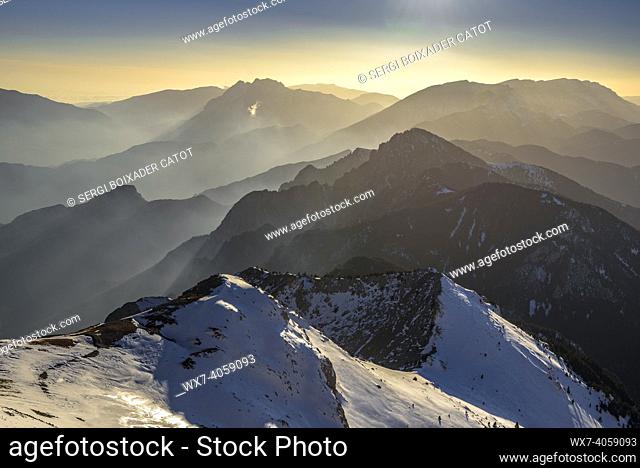 Winter sunset seen from the summit of the Tosa d'Alp and the Niu de l'Ã. liga refuge (Cadí-Moixeró Natural Park, Catalonia, Spain, Pyrenees)