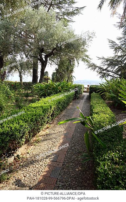 03 September 2018, Italy, Taormina: A path in the Giardino Pubblico in Taormina. The approximately three-hectare site belonged to members of the small English...