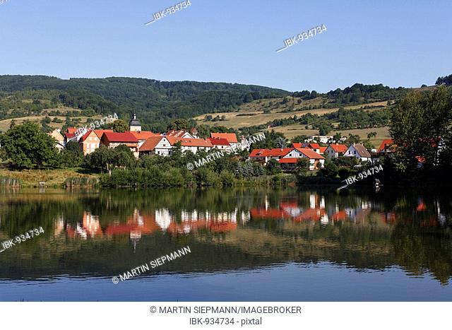 Lake with the village of Seeba, Rhoenblick municipality, Rhoen, Thuringia, Germany, Europe