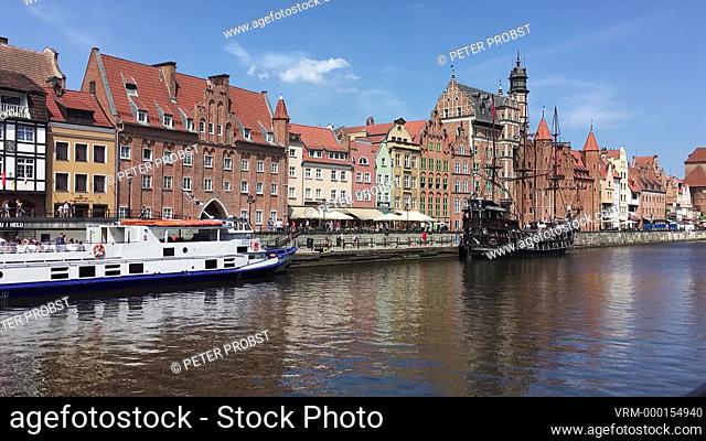 Old town of Gdansk with pedestrians in the Long market in front of the Golden Gate - Poland