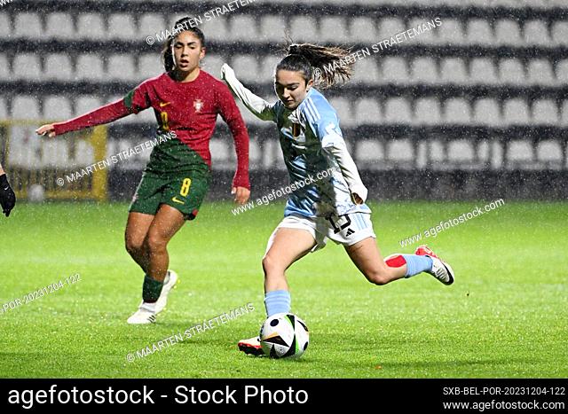 Angel Kerkhove of Belgium battles for the ball with Leticia Almeida () of Portugal during a friendly soccer game between the national women under 23 teams of...
