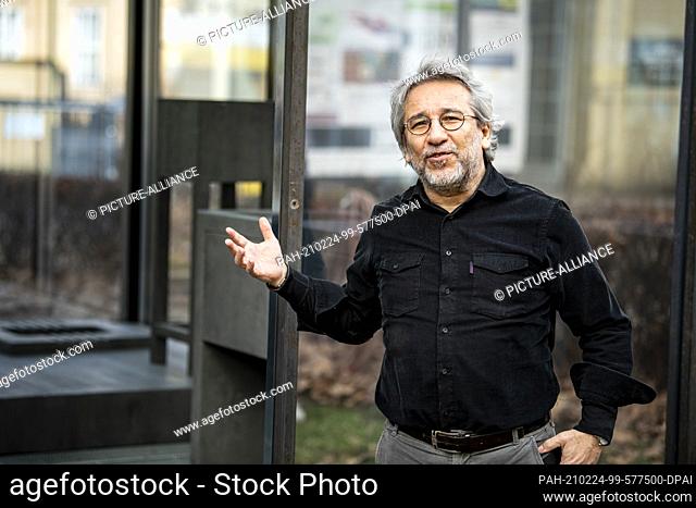 24 February 2021, Berlin: Can Dündar, journalist and former editor-in-chief of the Turkish weekly Cumhuriyet, stands during a press tour of exhibitions at the...